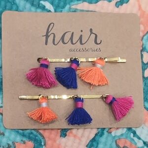 scunci Gold Hair Clips with Pink, Blue, and Orange Tassels